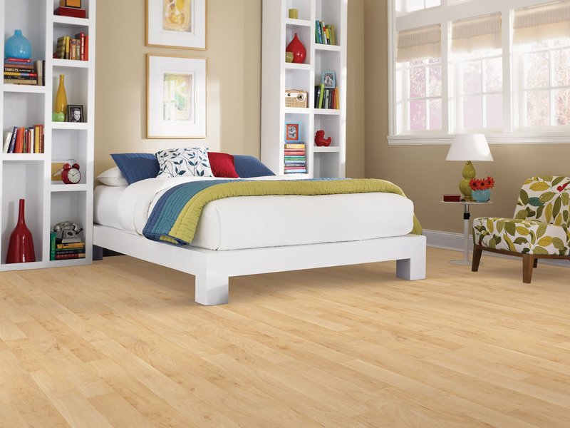 Bright bedroom with hardwood flooring